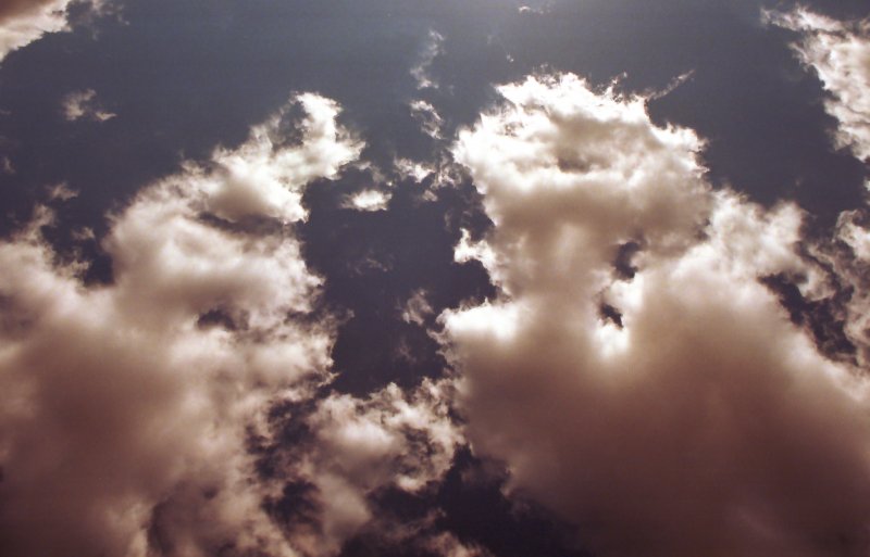 Meeting of the clouds - by Tony Karp